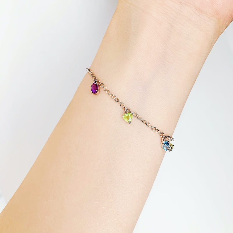 18K/ 750 White Gold Amethyst, Peridot & Blue Topaz Charm Bracelet