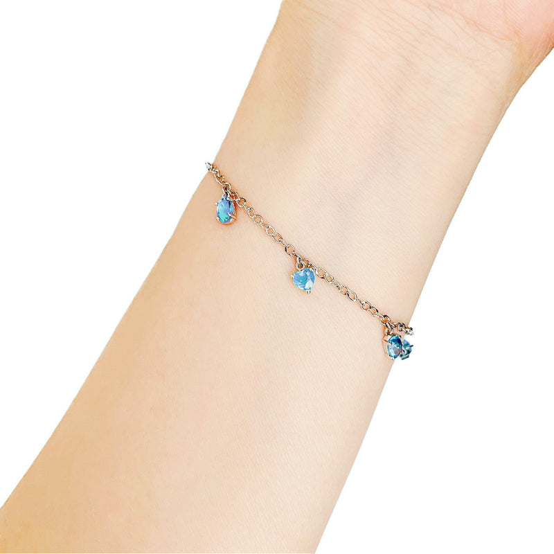 18K/ 750 White Gold Blue Topaz & Peridot Charm Bracelet